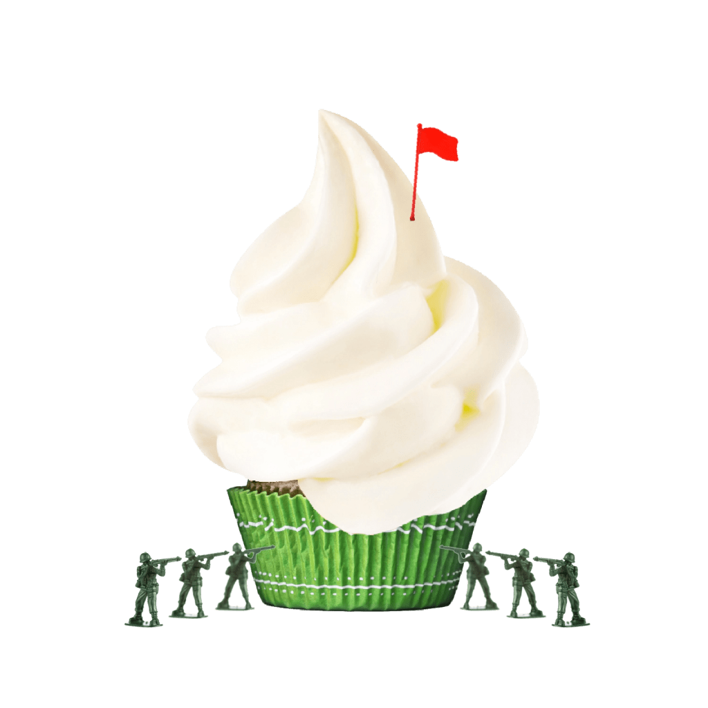 cupcake with six toy soldiers surrounding it - a toy flag is planted on top of it